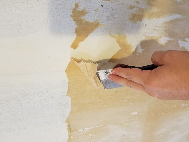 Scraping wallpaper residue