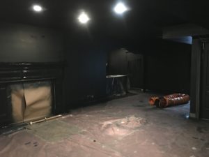 room with black high gloss paint