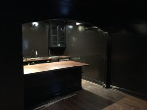 room with black high gloss paint