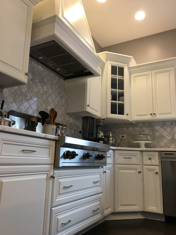 painting kitchen cabinets white - how much does it cost to paint cabinets